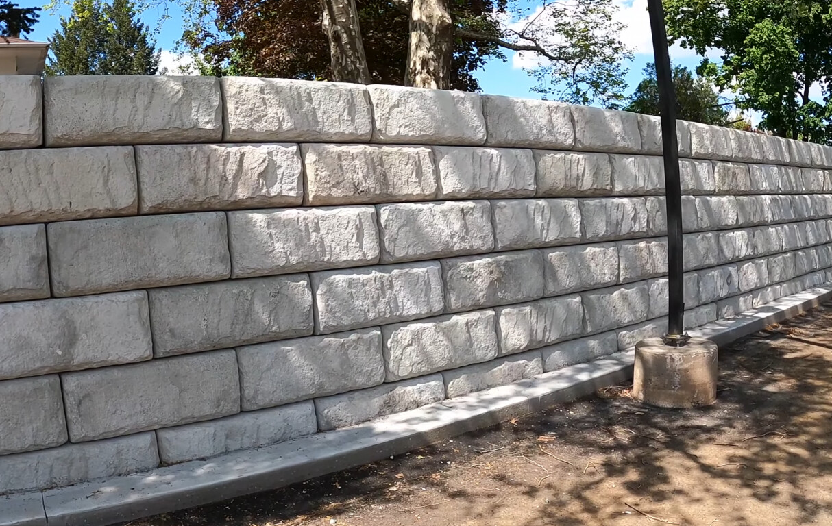Durable concrete retaining wall construction
